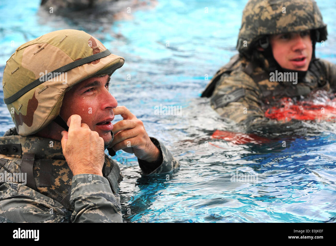 Lt. Col. Ronald Pieri dones his helmet during marine combat water survival training, April 25. The addition of a helmet, flack Stock Photo