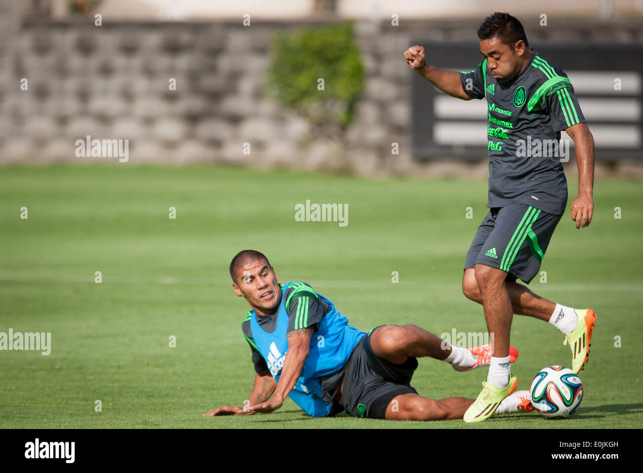 Mexico City, Mexico. 14th May, 2014. Carlos Salcido (L) and Marco Fabian from Mexico's national soccer team take part in a training session, in Mexico City, capital of Mexico, on May 14, 2014. Credit:  Pedro Mera/Xinhua/Alamy Live News Stock Photo