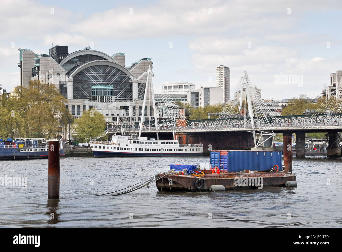 London, a view from the South Bank towards London Charing Cross train station and Hungerford Bridge in London, Stock Photo