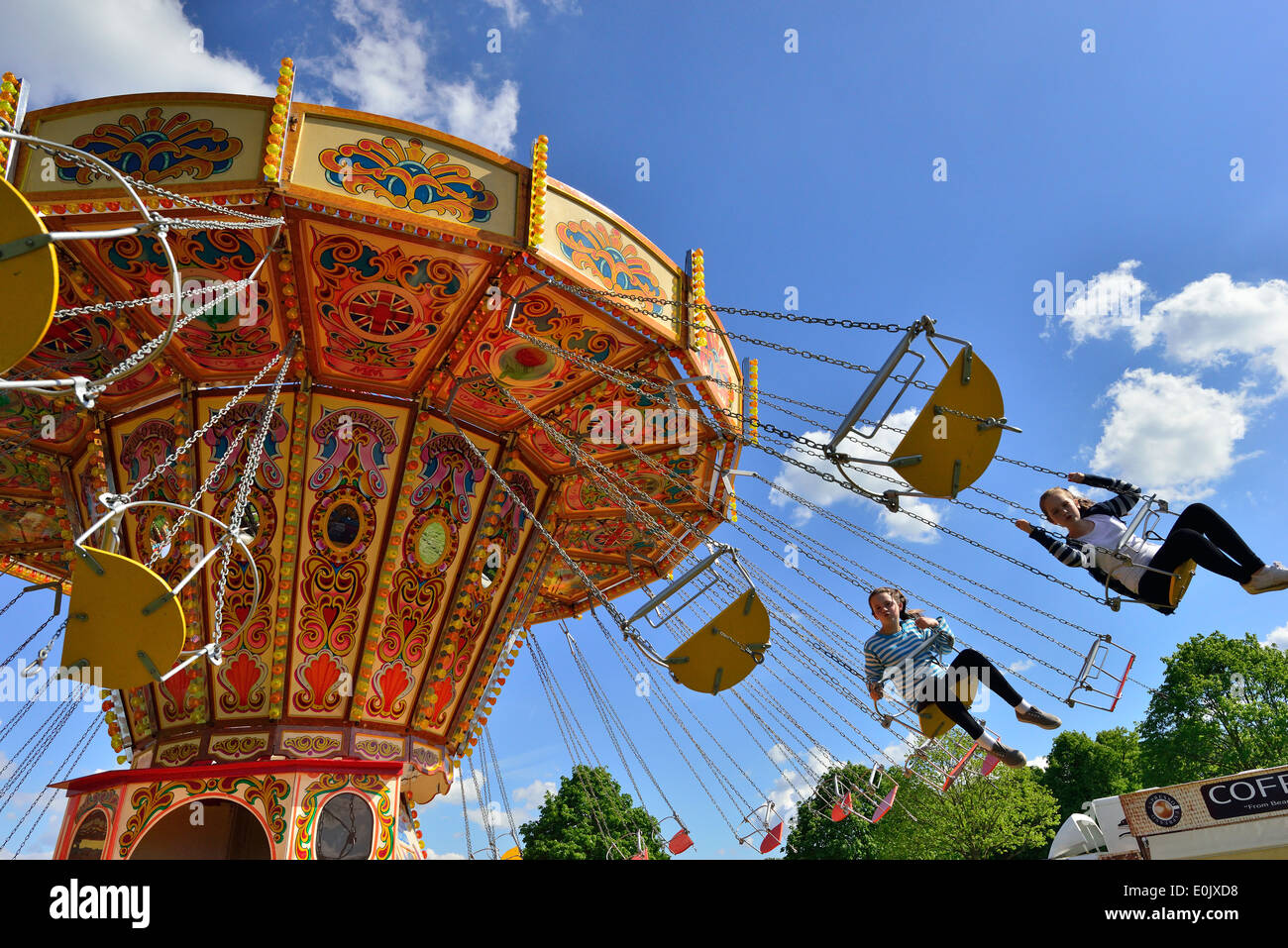 British Fair Rides Old fashioned fairground swing hi-res stock photography and images - Alamy