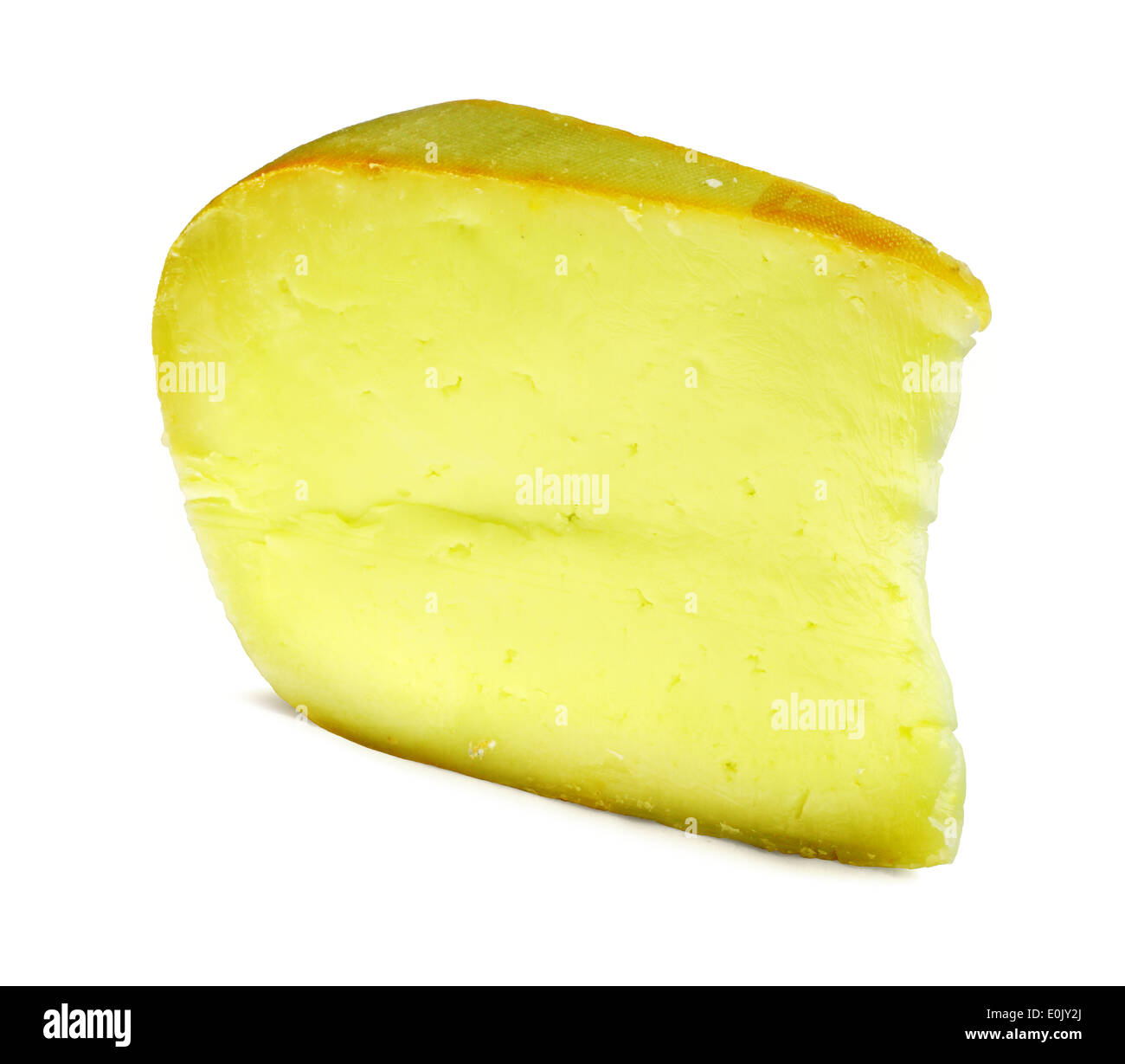 Portion of Gouda with wasabi green Cheese isolated on white background Stock Photo