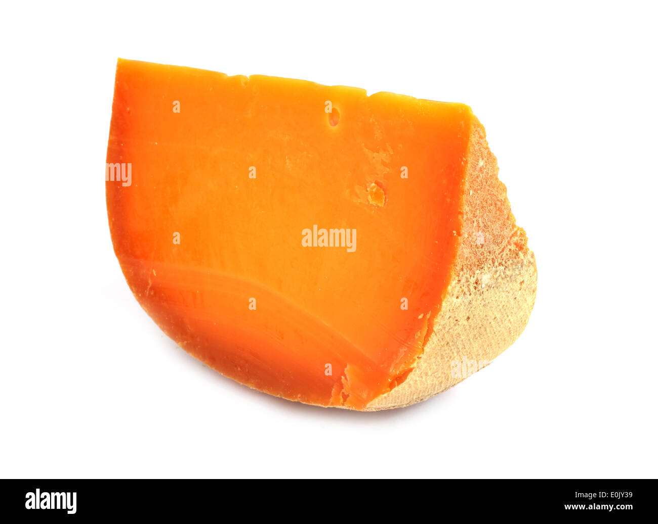 Portion of Mimolette Cheese isolated on white background Stock Photo