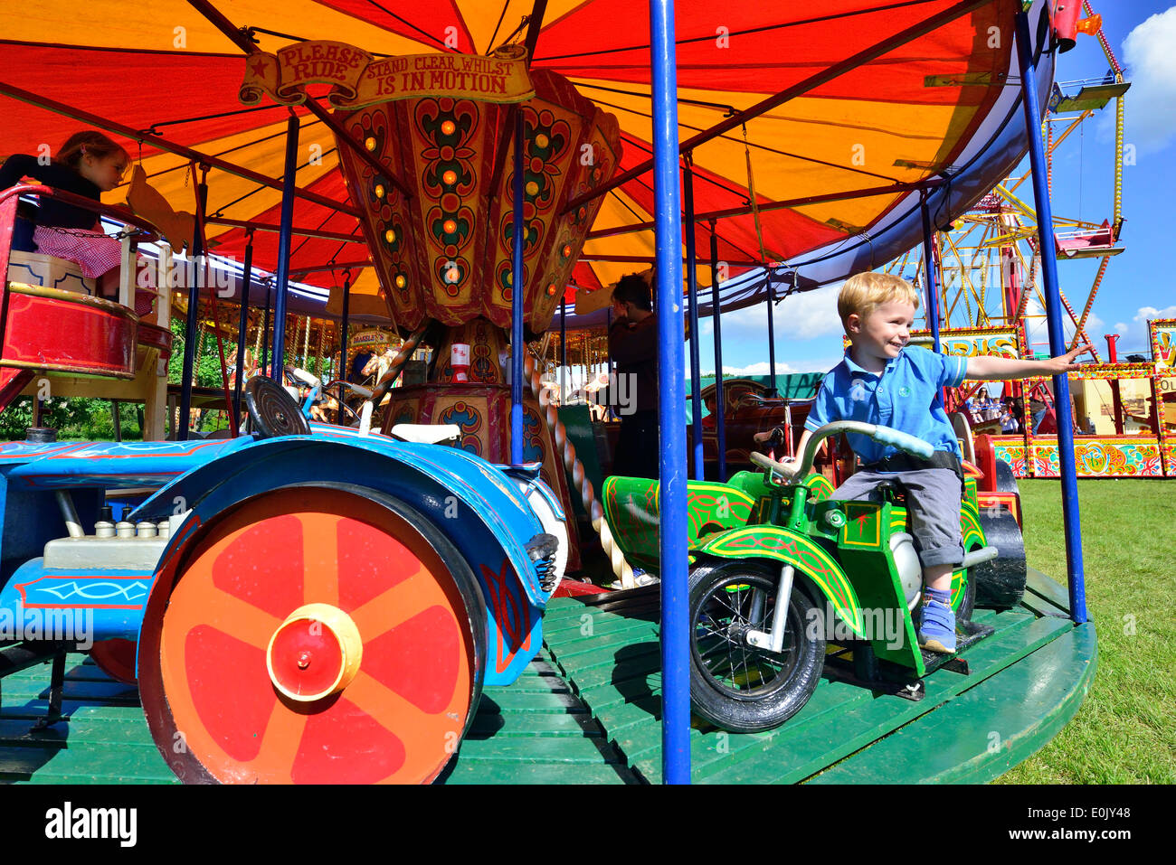 Child carousel hi-res stock photography and images - Alamy
