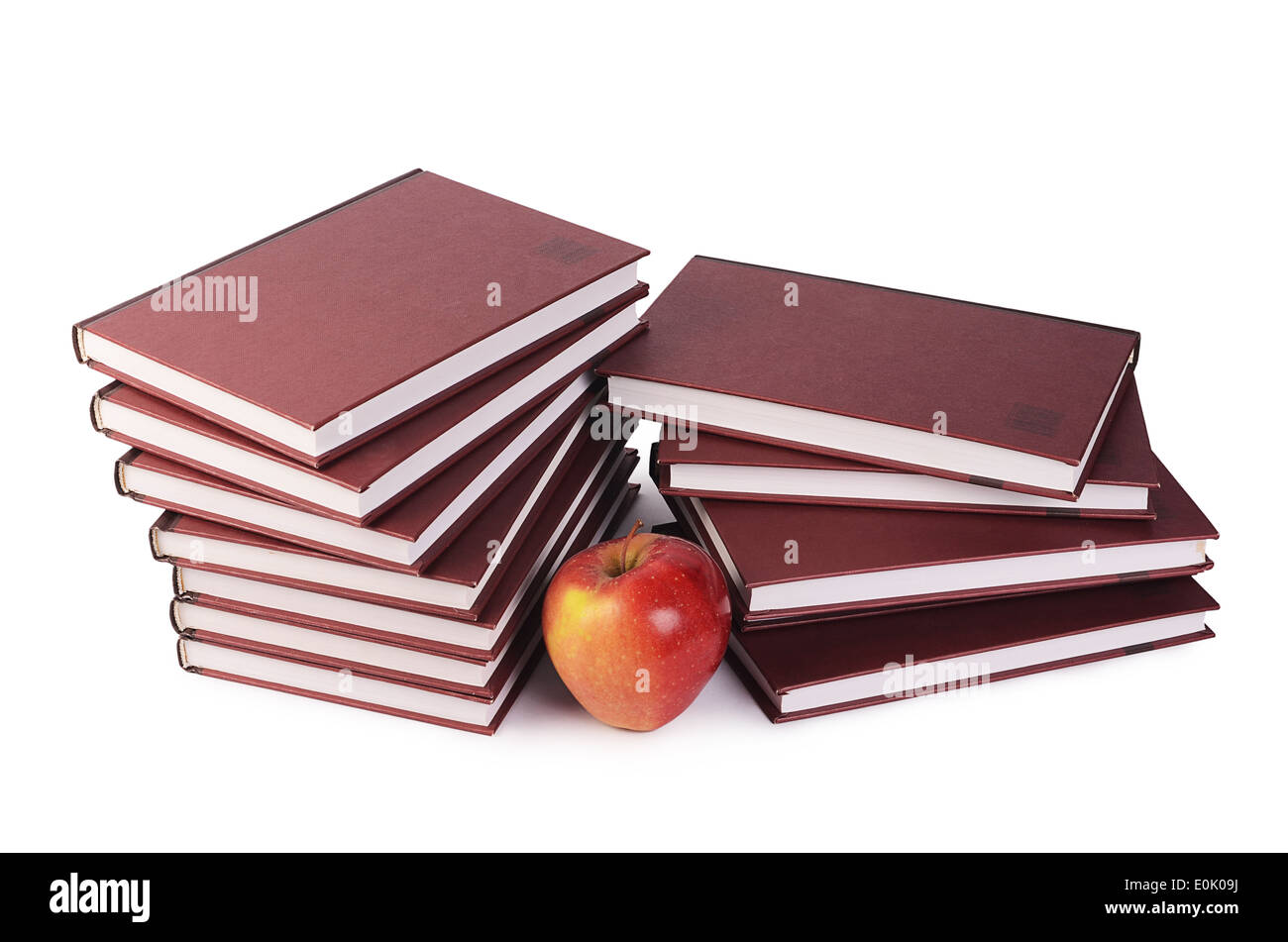 Book with apple isolated on white background Stock Photo - Alamy