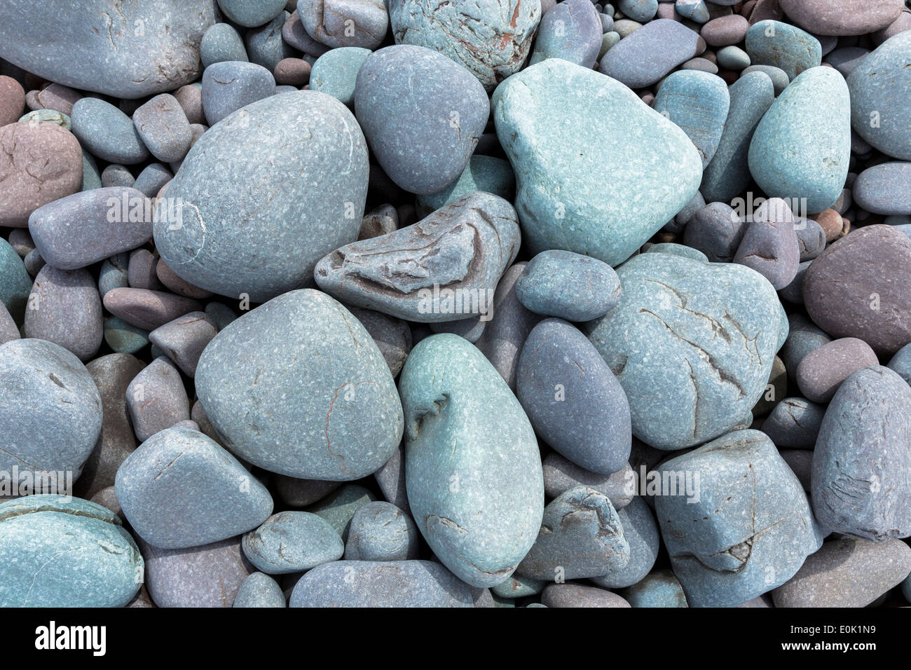 Pebbles in pastel colours on Bossington Beach, Somerset, UK Stock Photo