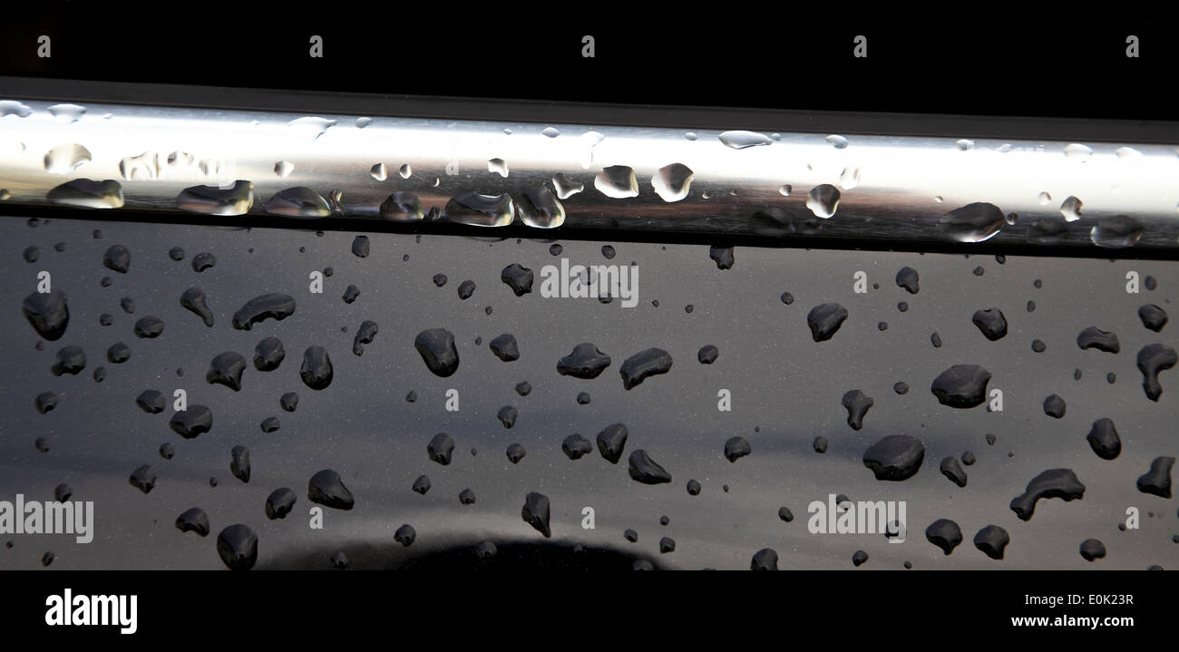 9477. Raindrops on car, Kent Stock Photo