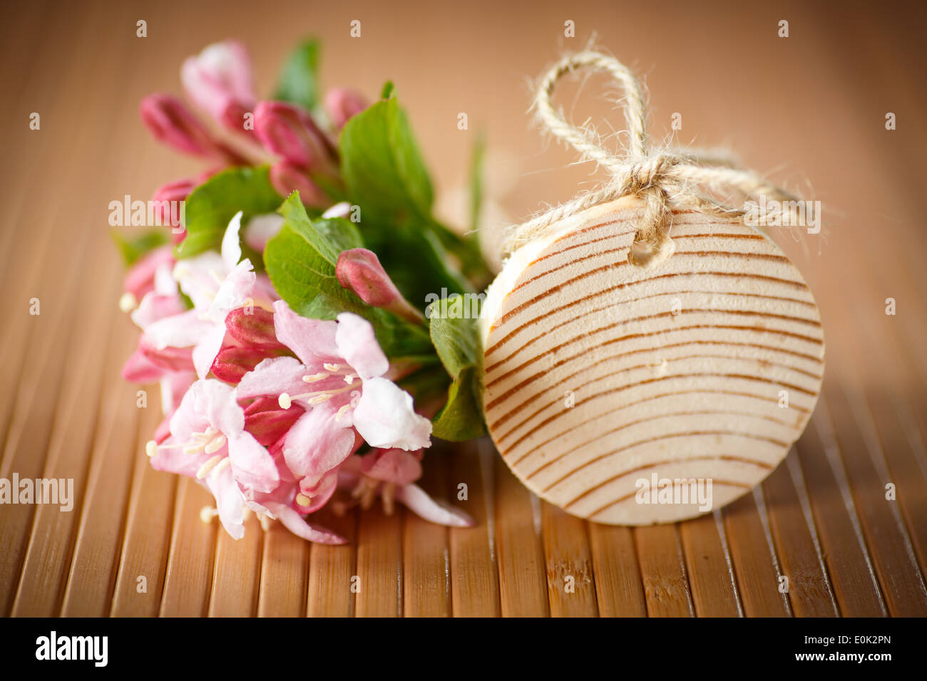 Weigela blooming beautiful wood vase on the table Stock Photo Alamy