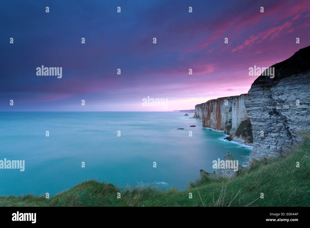 dramatic fire sunrise over cliffs in ocean, Etretat, France Stock Photo ...