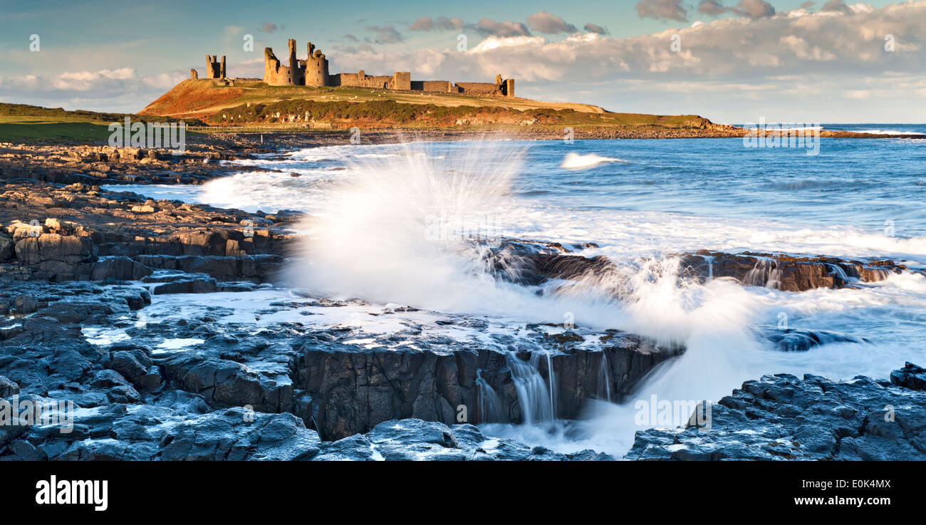 Dunstanburgh Castle viewed from the south, Near Craster, Northumberland, England, UK Stock Photo