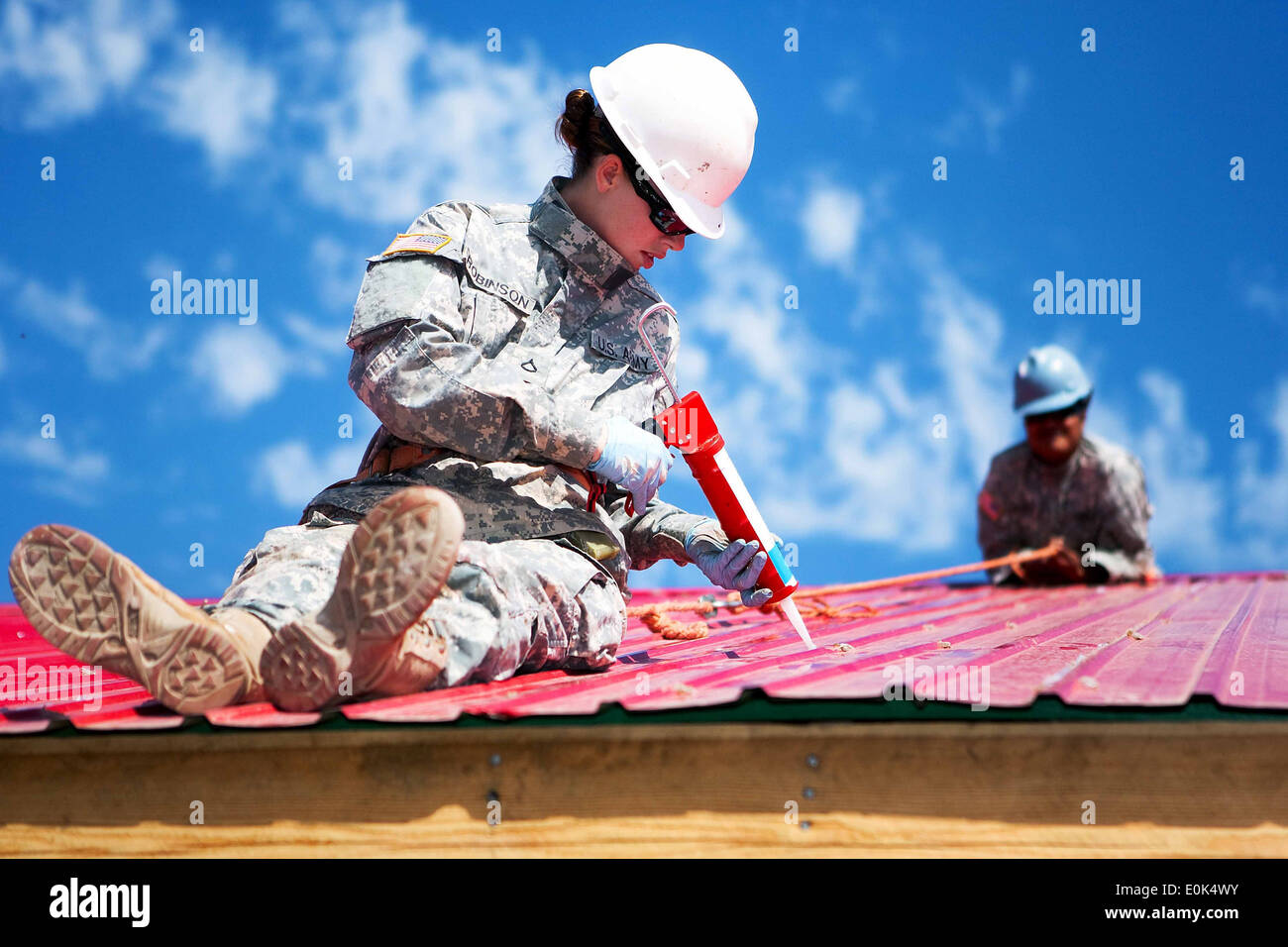 Army Pfc. Danielle Robinson, a carpenter and mason with the 84th Battalion, 30th Brigade, 643rd Company out of Schofield Barrac Stock Photo