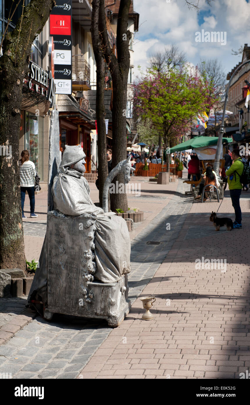 Old silver mime in Zakopane Krupowki Street Stock Photo