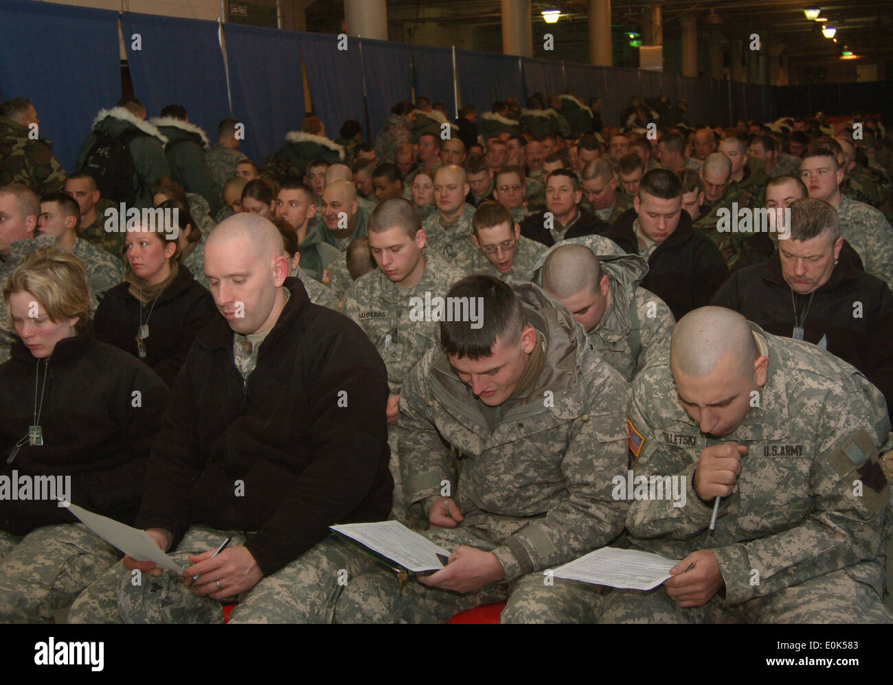 Pennsylvania and Delaware National Guard members listen attentively to the briefings during the Joint Reception Staging Orienta Stock Photo