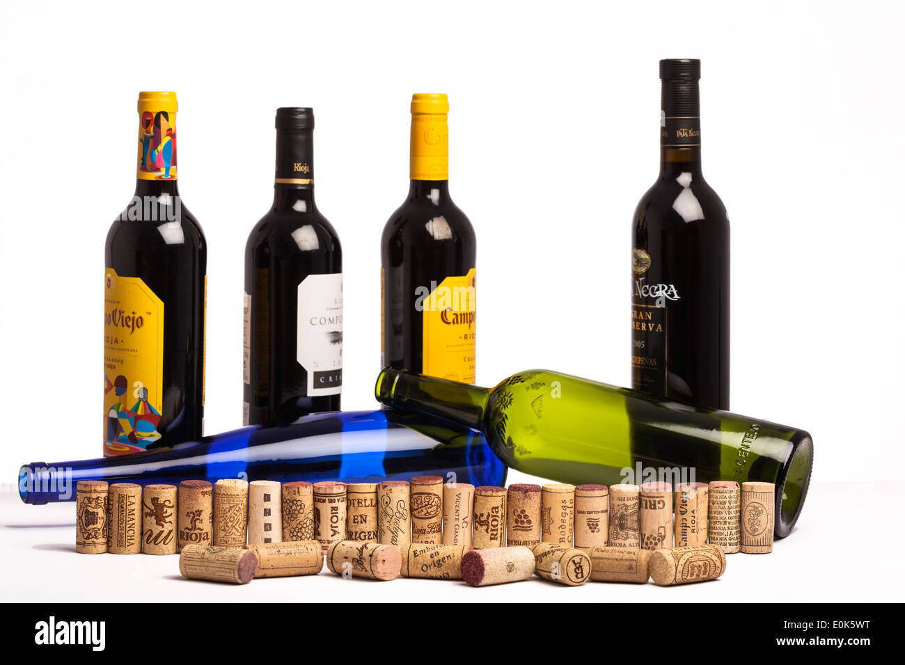 Corks and wine bottles from different Spanish wine growing regions.On white background, Concept for varieties of Spanish wines. Stock Photo