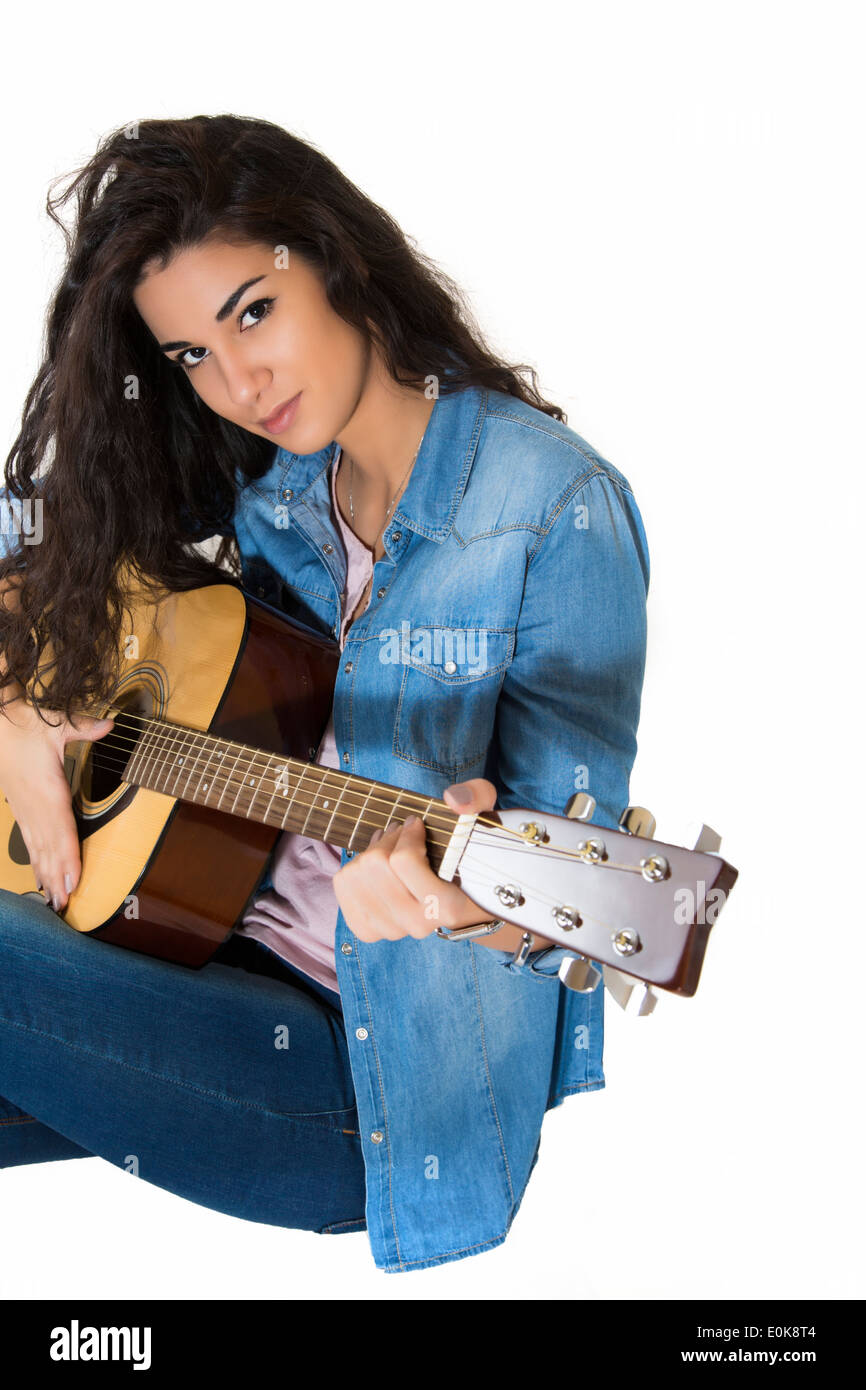 Young woman playing a guitar Stock Photo - Alamy