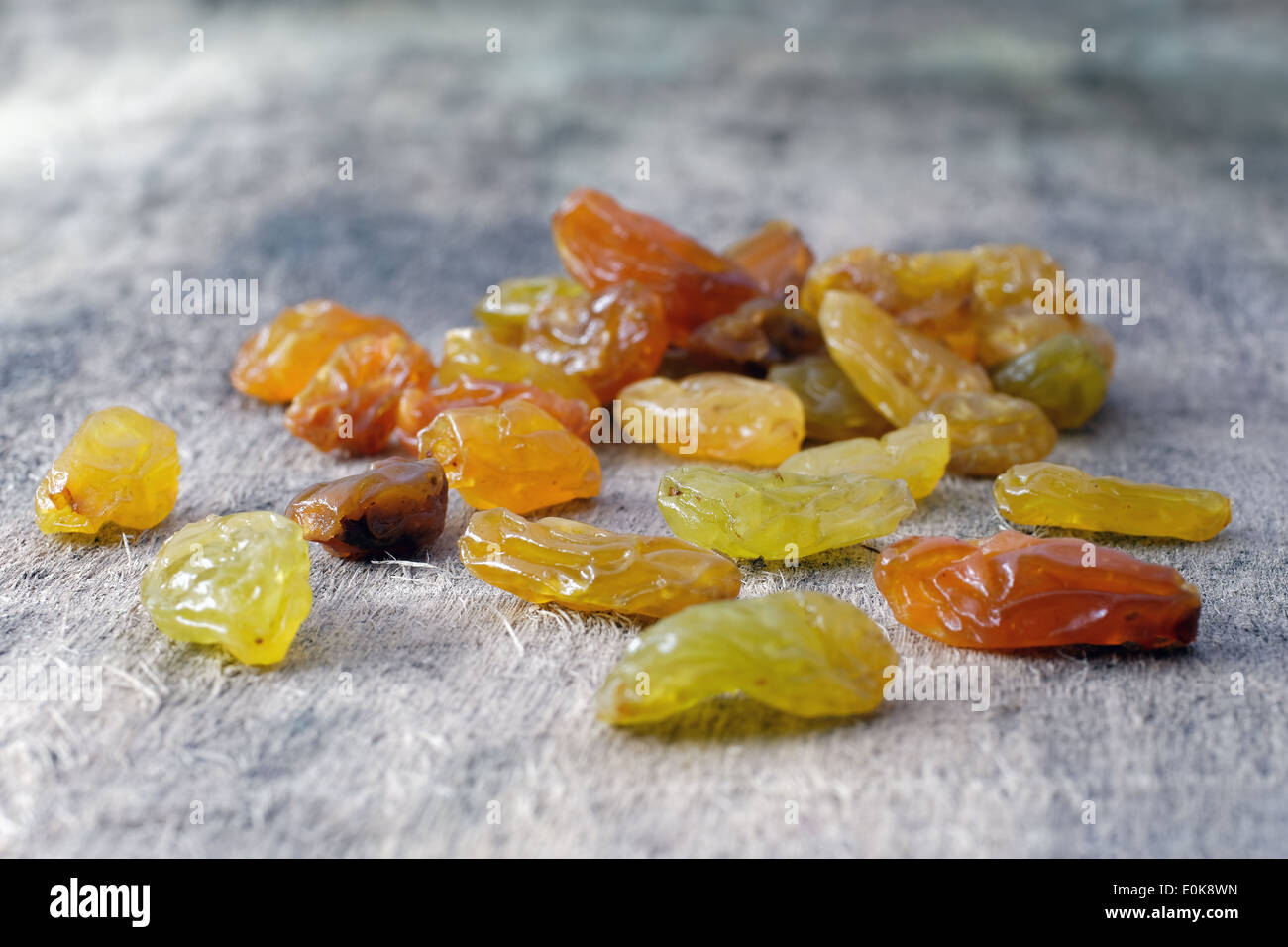 Giant juicy raisins on wood Stock Photo Alamy