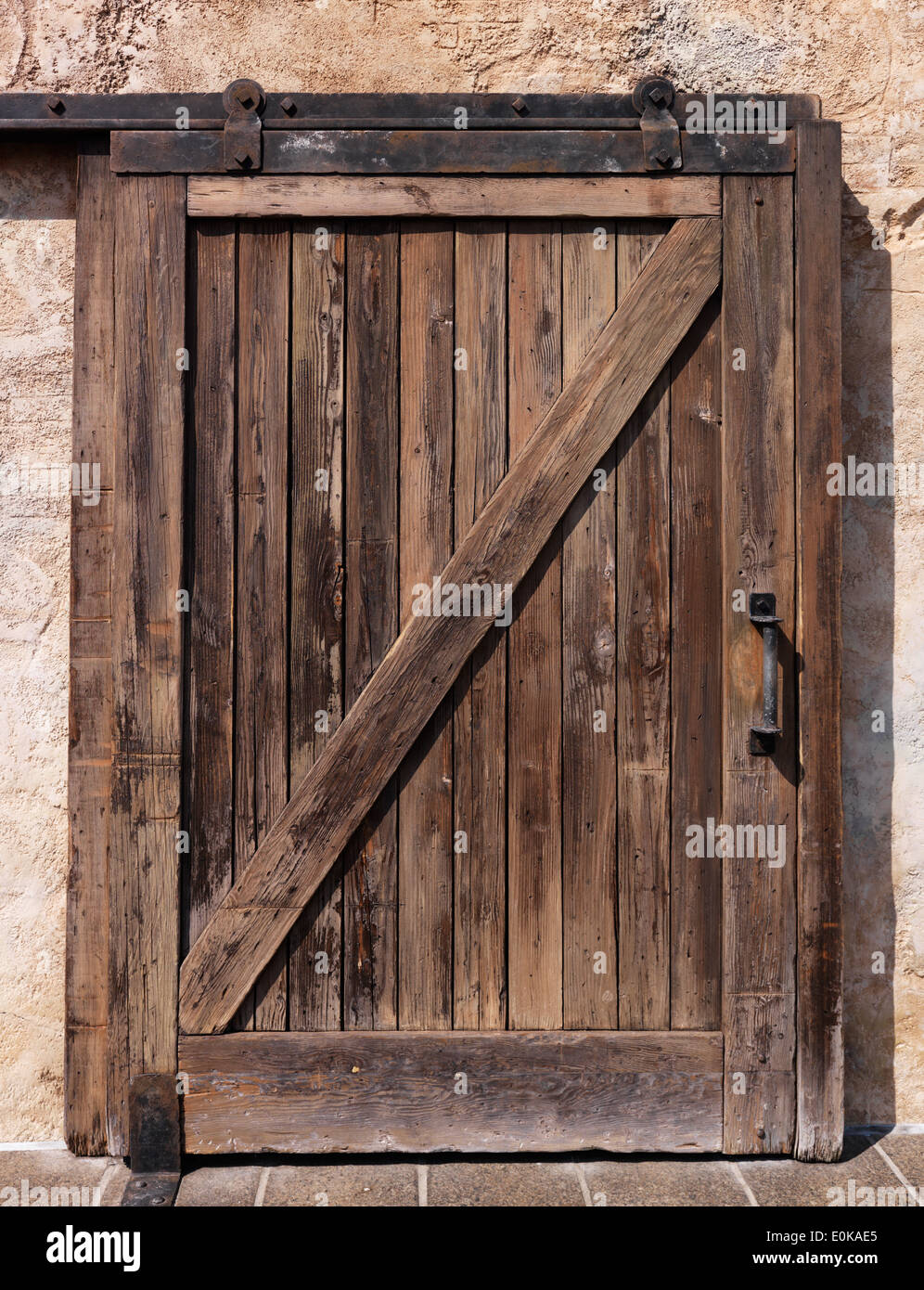 Old sliding wooden door rustic texture Stock Photo