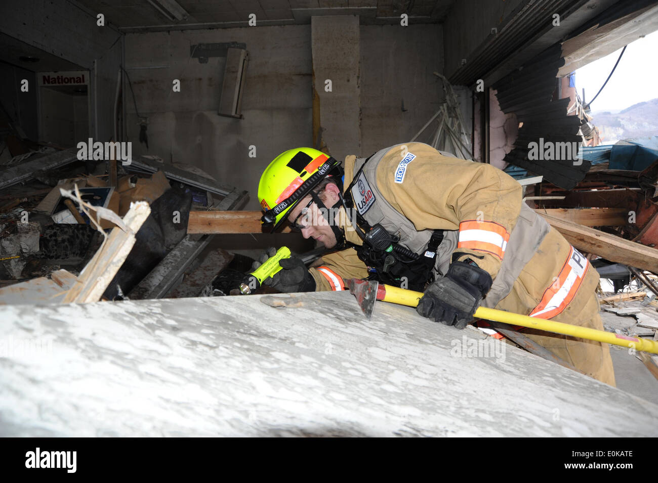 A member of the Fairfax County Urban Search and Rescue Team searches