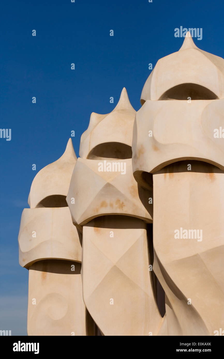 Chimneys covered with ceramic fragments that look like helmets at La Pedrera (Casa Mila) in Barcelona, Spain. Stock Photo