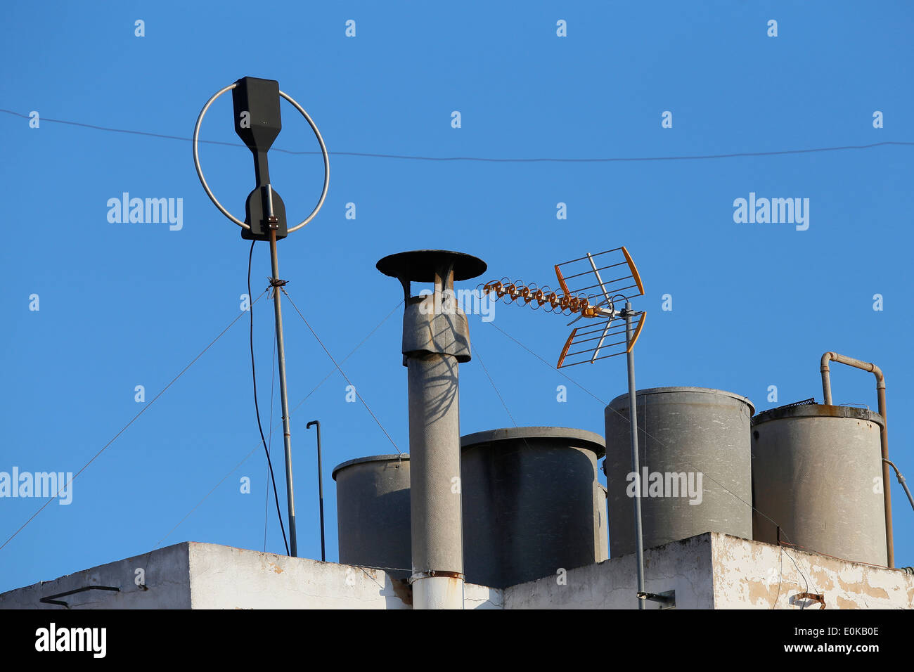 Different tv antennas over residential buildings in the Spanish Balearic island of Majorca Stock