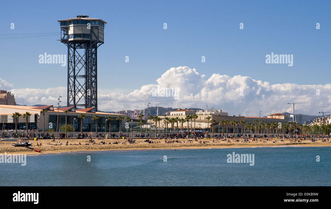 Beach of San Sebastia with the cable car tower of the port of Barcelona ...
