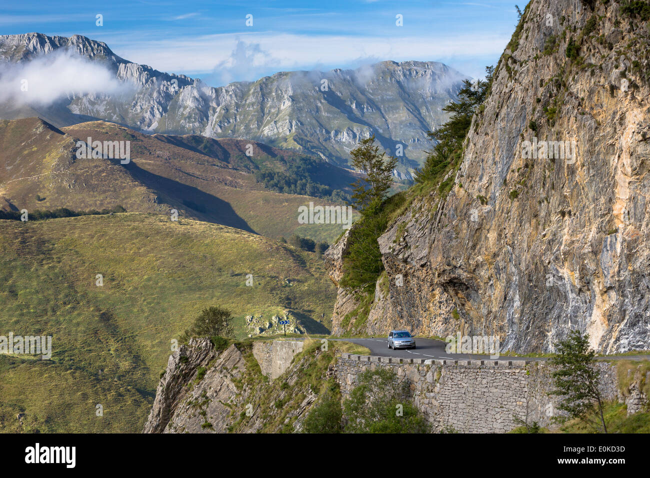 Motorist touring by car on empty road in the Pyrenees in Parc National des Pyrenees Occident, France Stock Photo