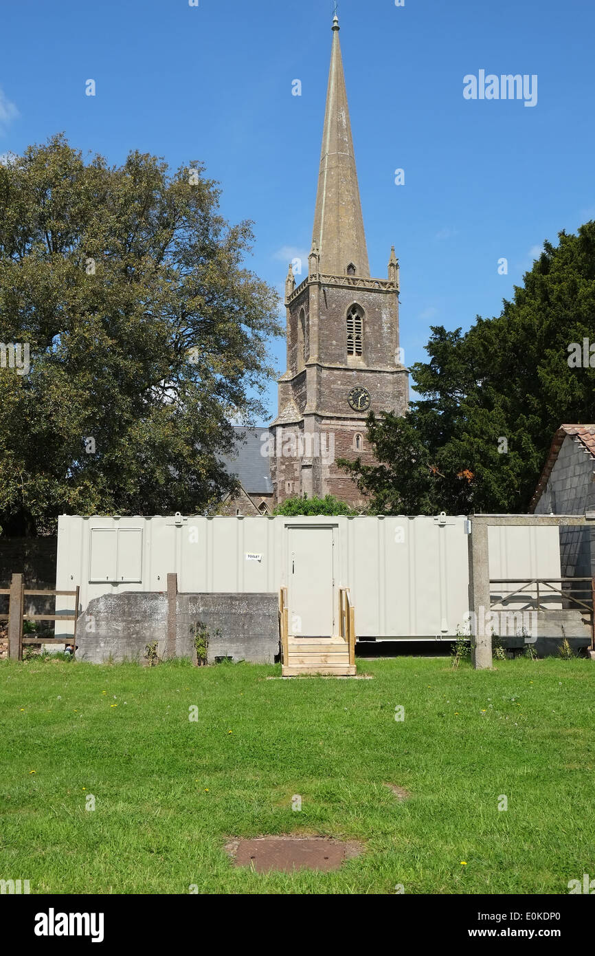 Temporary toilet block on the grass in front of St Michael's Church in Winterbourne, South Gloucestershire, 15 May 2014 Stock Photo