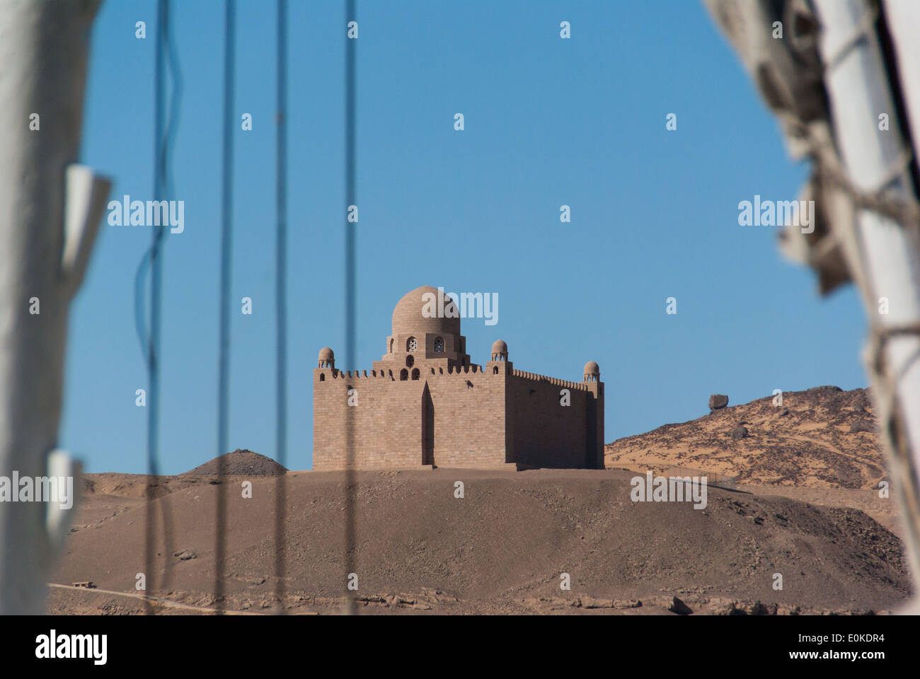 Mausoleum of Aga Khan III, visible through feluccas' masts, Aswan, Upper Egypt Stock Photo