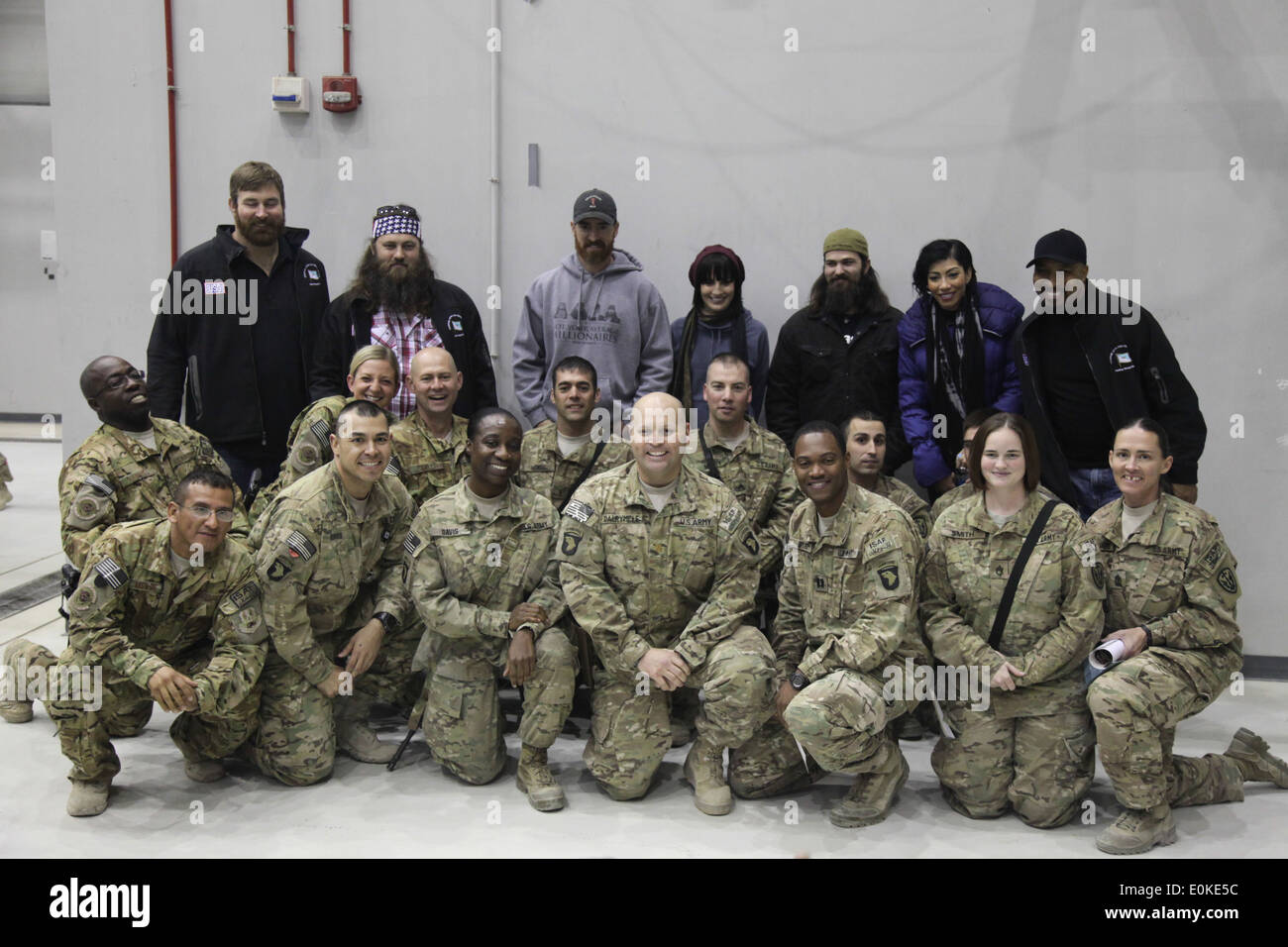 USO Tour celebrities pose for group photos at the end of the Holiday Troop Visit, USO show held on Bagram Air Force Base, Decem Stock Photo