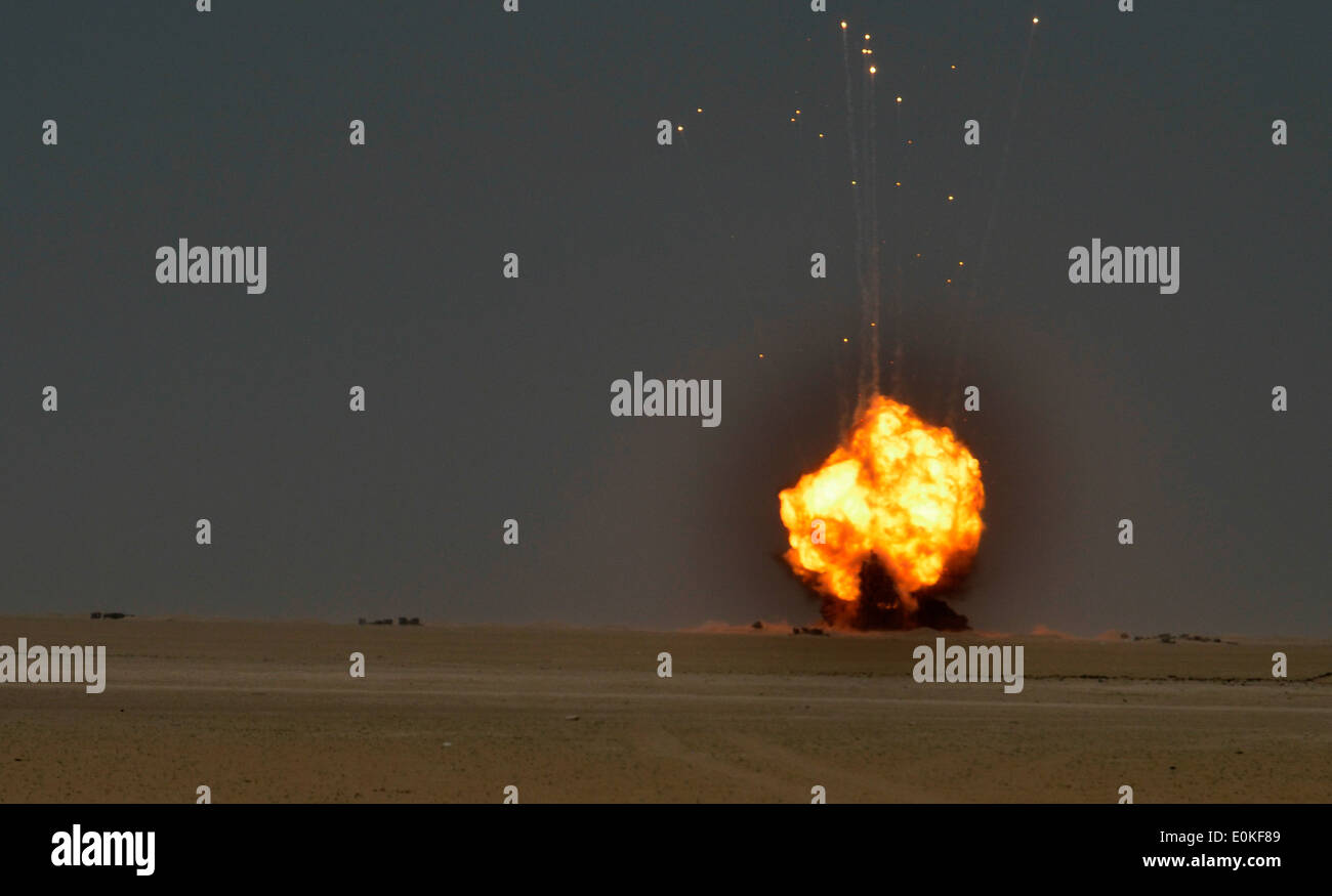 Munitions being detonated by the 753rd Ordnance Company from the West Virginia Army National Guard at an EOD range in the deser Stock Photo