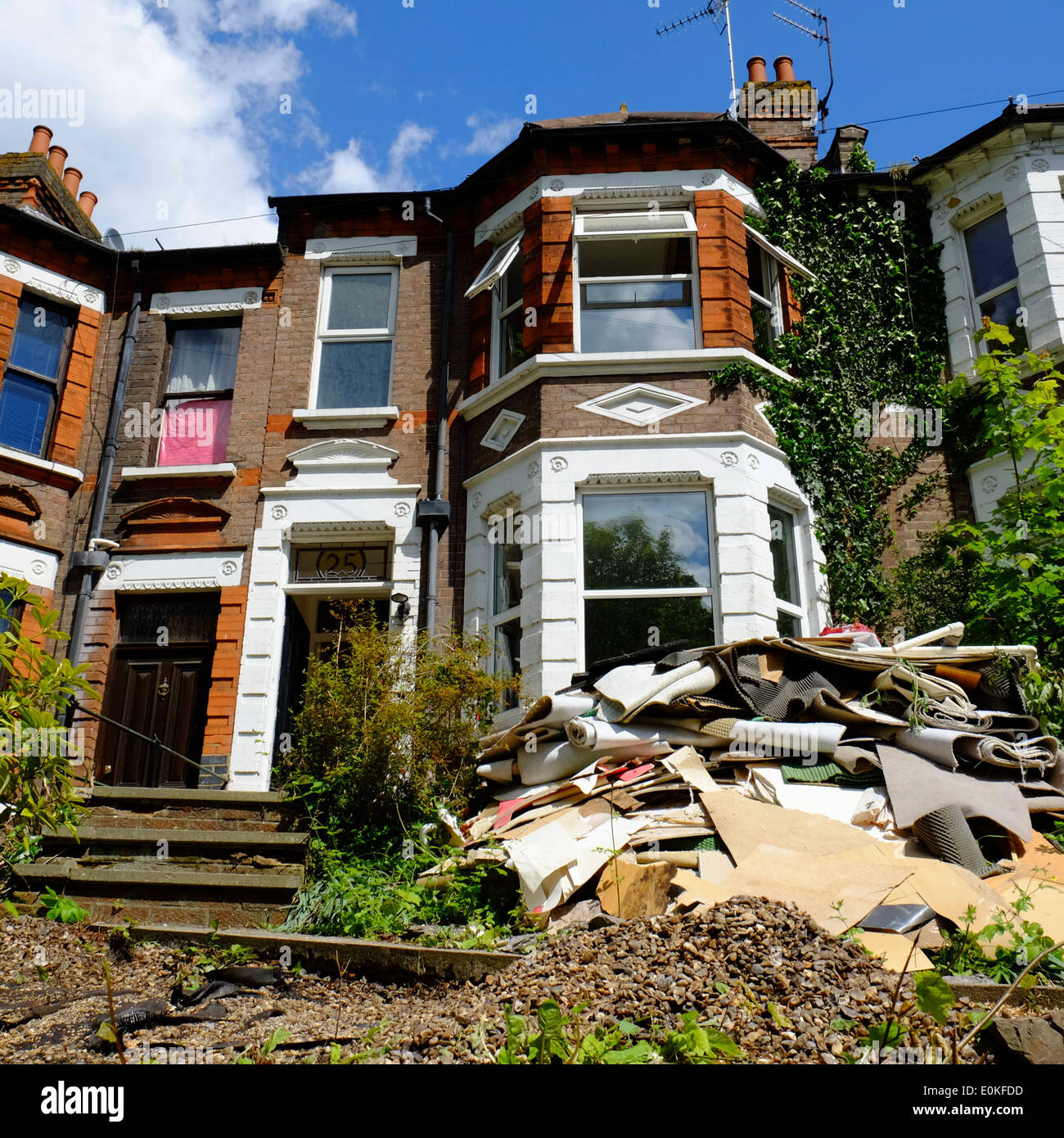 old carpets dumped outside a house in Luton Stock Photo Alamy