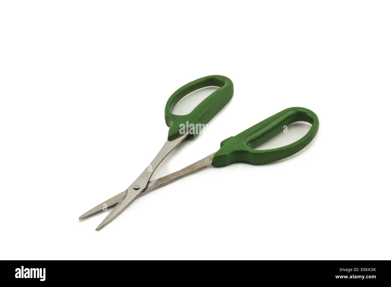Green scissors on white background Stock Photo
