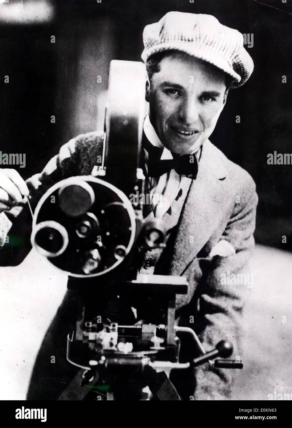 Portrait of British actor and director Charlie Chaplin with camera in England Stock Photo