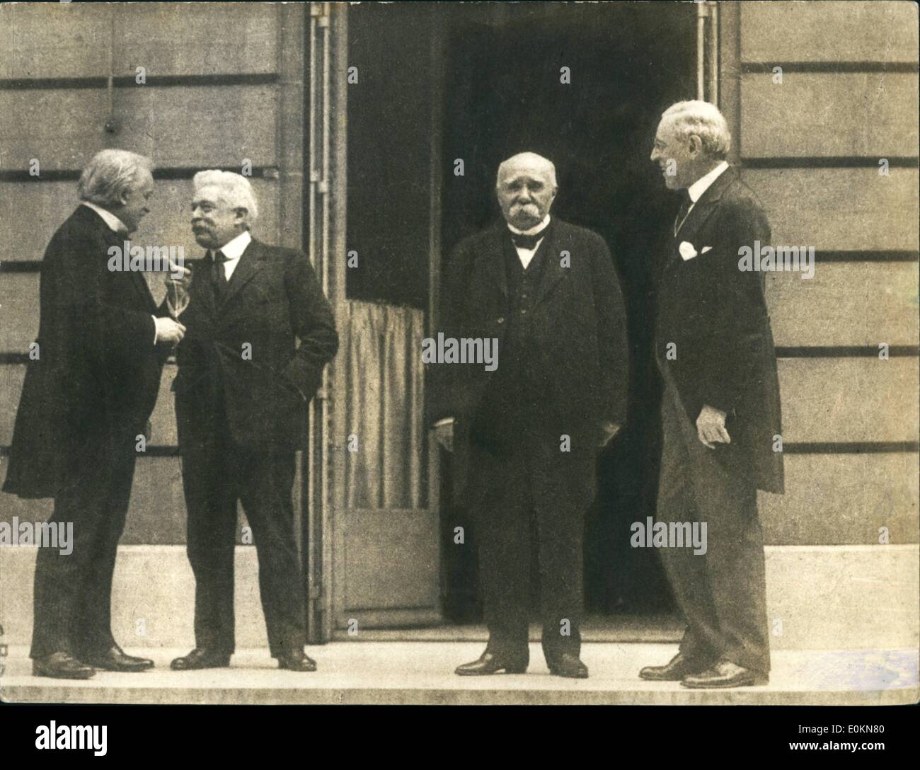 Jun. 06, 1919 - Treaty of Versailles After signing the Peace Treaty with the Germans on June 28 1919 at Versailles, the principal signatories step out on to a terrace. OPS: From left: Lloyd George, British Prime Minister; Italian Premier Orlando; Georges Clemenceau, French Premier and US President Woodrow Wilson. Stock Photo