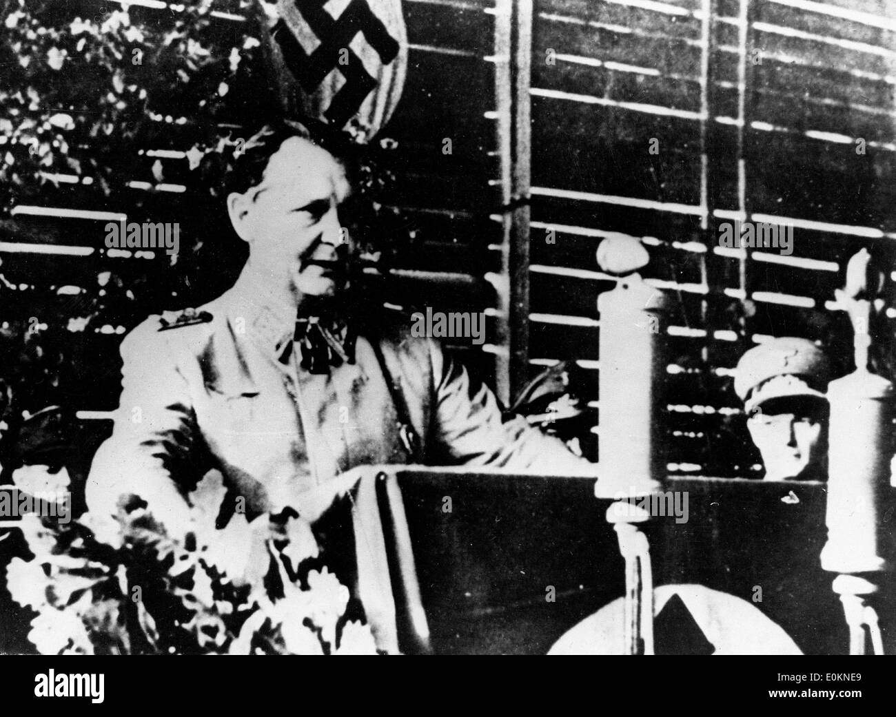Jan. 01, 1930 - Munich, Germany - File Photo: circa 1930s-1940s. HERMANN GOERING, Chairman of the Council for the defense of the Reich, addressing workers of an armament plant while on an inspection tour of German fighter plane airdroms 'Stressed the unshakeable conviction of a German victory', according to the caption accompanying this German photo supplied by Pressen's Bild, Swedish Picture Agency. Stock Photo