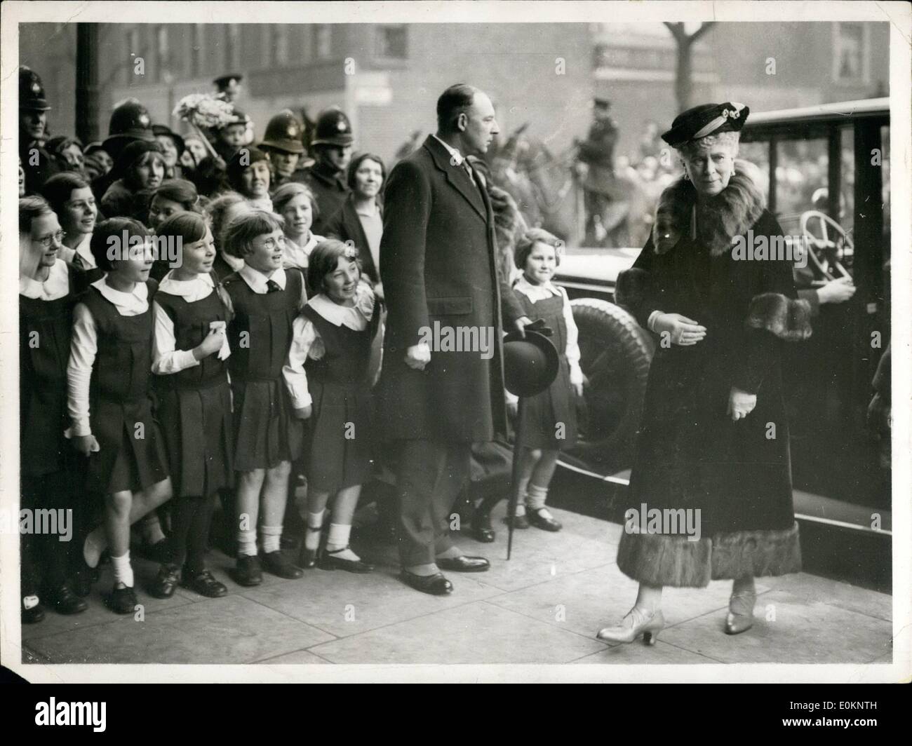 Feb. 02, 1933 - The Queen attends performance at Sadler's Wells; Seven thousand school children lined Rosebery Avenue, E.C. between Finsbury Town Hall, and Sad;er's Well Theater this afternoon, when the Queen paid a visit to the Theater for the special performance of ''The Merchant of Venice''. Photo Shows The Queen arriving at Sadler's Wells watched by Schoolchildren. Stock Photo