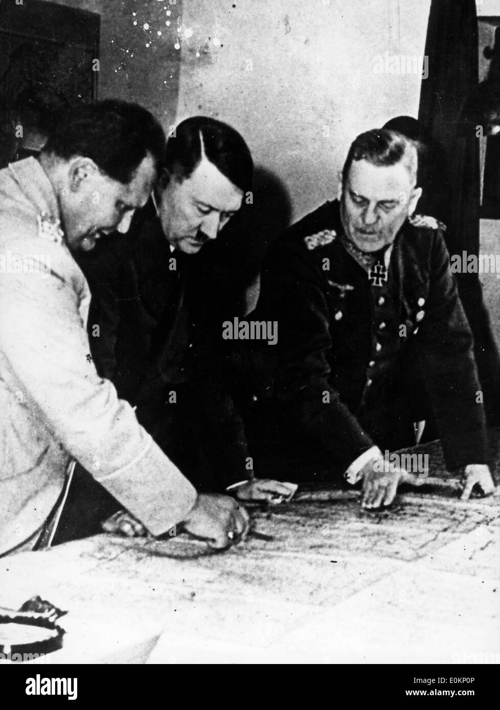 Adolf Hitler with Hermann Goering studying maps Stock Photo