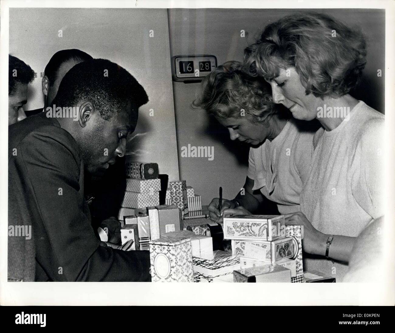 Jul. 24, 1944 - Brazilians Delayed: Brazilian soccer star Pele buying gifts at London Airport this evening as the Brazilian team awaited the arrival of their airplane to take them home to Brazil today, July 24. The Departure of the plane was delayed for hours ad the Brazilians are expected to leae L Later in the Afternoon. Stock Photo