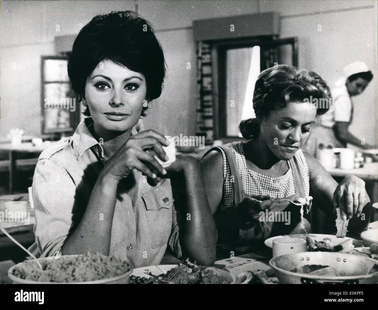 Nov. 11, 1944 - Sofia Loren in some scenes of her latest film ''Judith'' the actress is still turning in Israel. Photo shows Judith (Sofia Loren) and Hannah (Zipora Peled) in the kibbut dinning room. Stock Photo