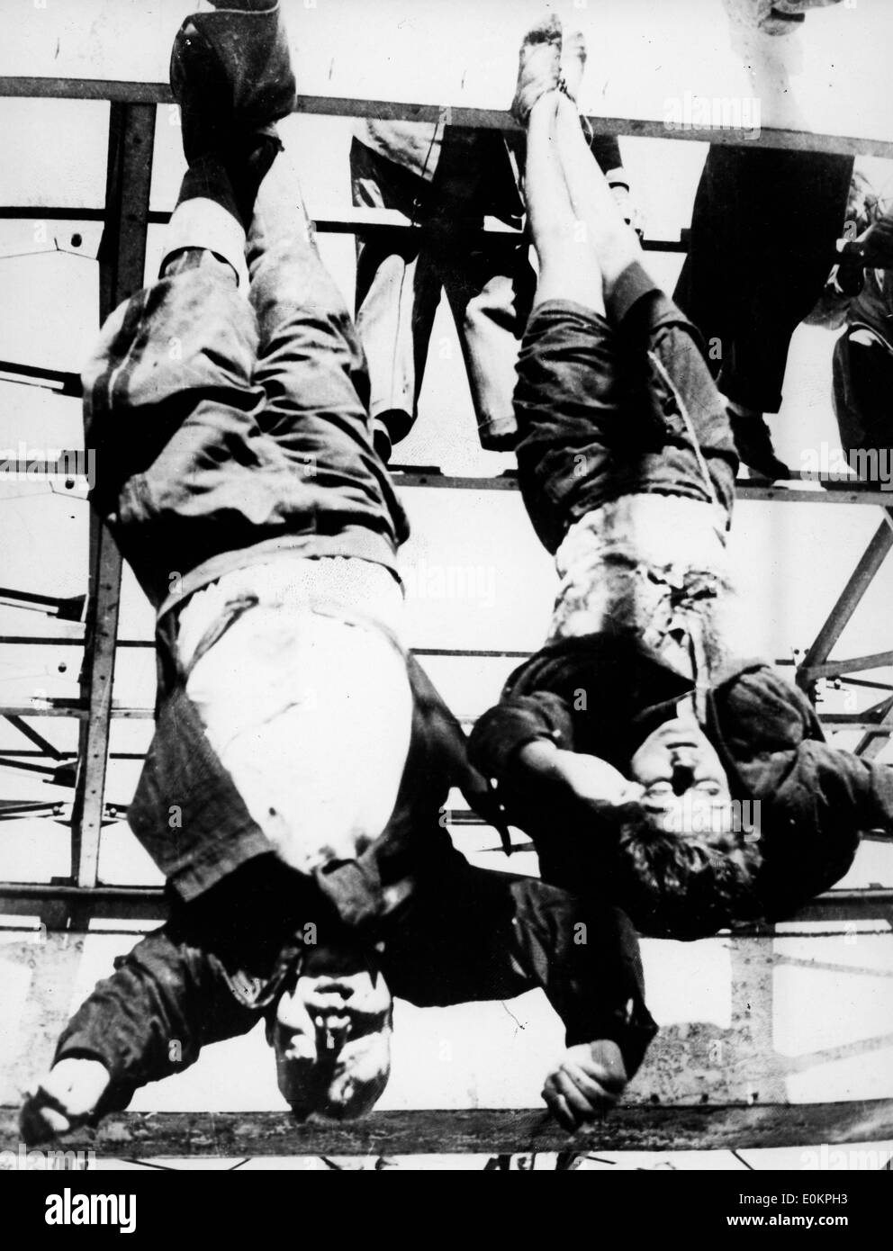 Benito Mussolini and Clara Petacci executed and hung for the public Stock Photo