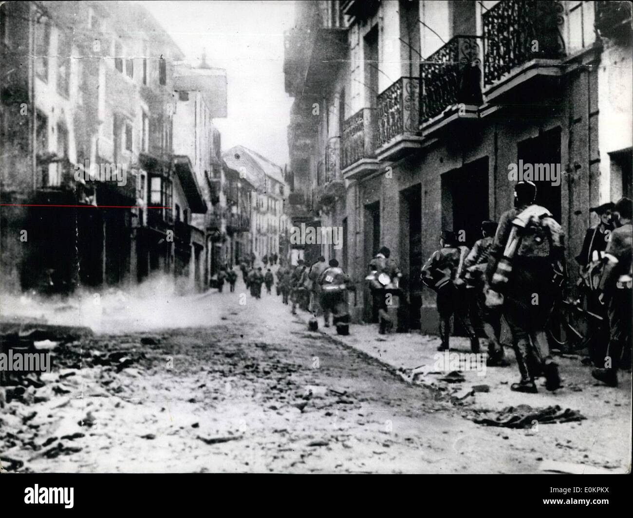 Sep. 09, 1936 - Spanish Civil War : Spanish Nationalist Troops Take part in the capture of Irun seeking cover of ruined buildings when Red airport were bombing the town. Stock Photo