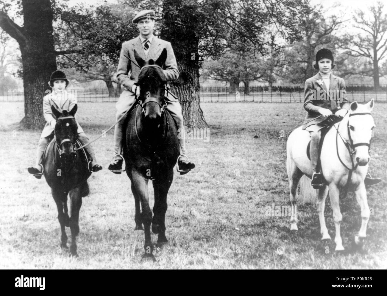 King George with daughters Princess Elizabeth and Margaret riding horseback Stock Photo