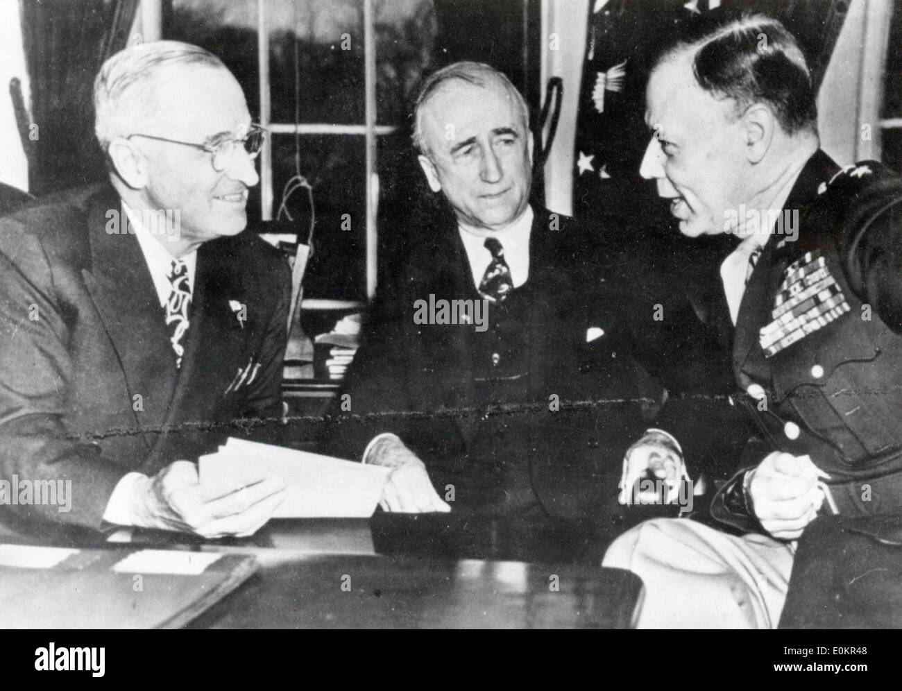 President Truman meeting with James Byrnes and Walter Smith Stock Photo