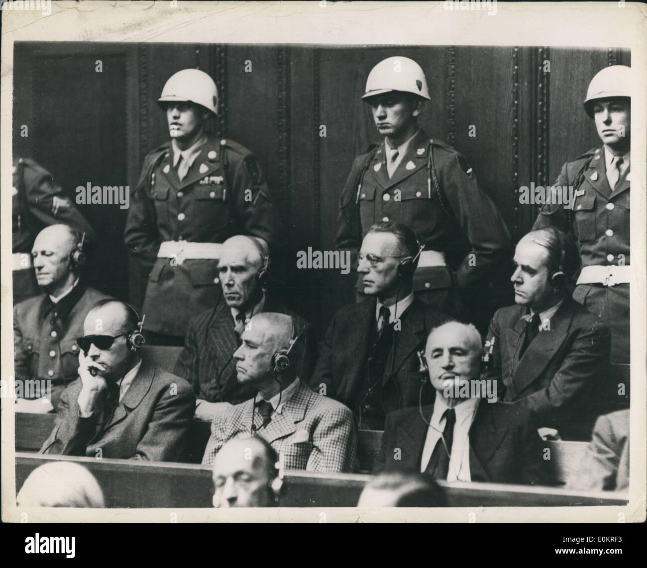 Sep. 09, 1946 - Judgement Day At Nuremberg Defendants Hear Verdict: Some of the chief defendants seen in the dock at Nuremberg Back now Left to Right Alfred Jodl, Franz Von Papen; Arthur Seys - Inquart; Albert Spee~. Front row Left to Right Erich Raeder; Wilhelm Frick and Julius Streicher.. They are listening to the verdict during the final stages of the greatest trial in history. Stock Photo