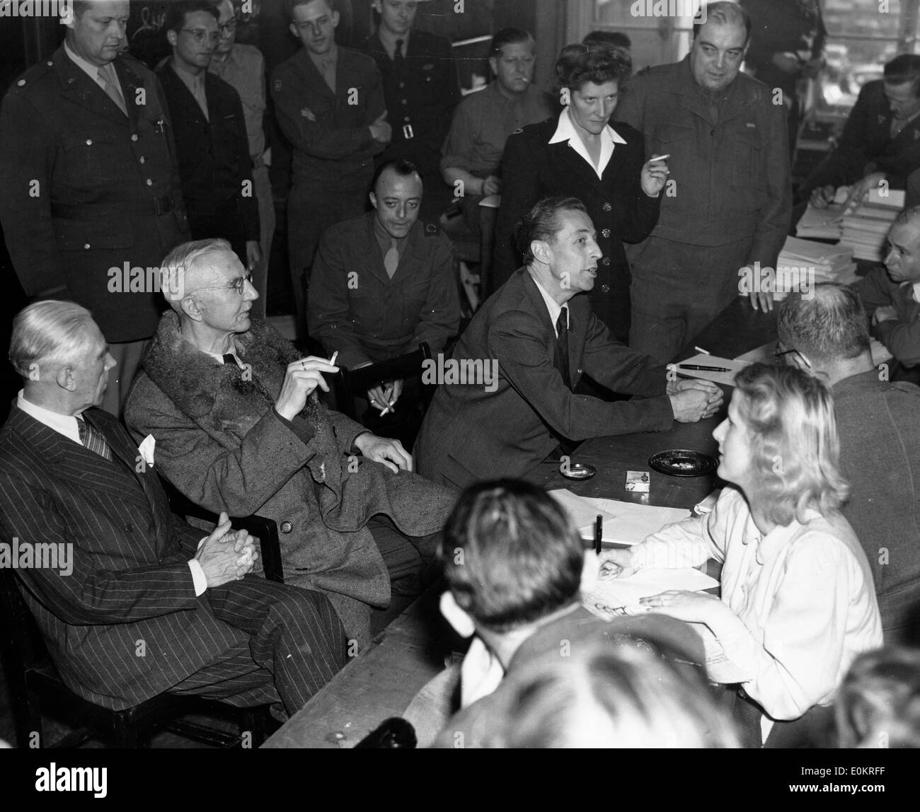 Franz Von Papen, Hjalmar Schacht, and Hans Fritzsche during a press conference Stock Photo