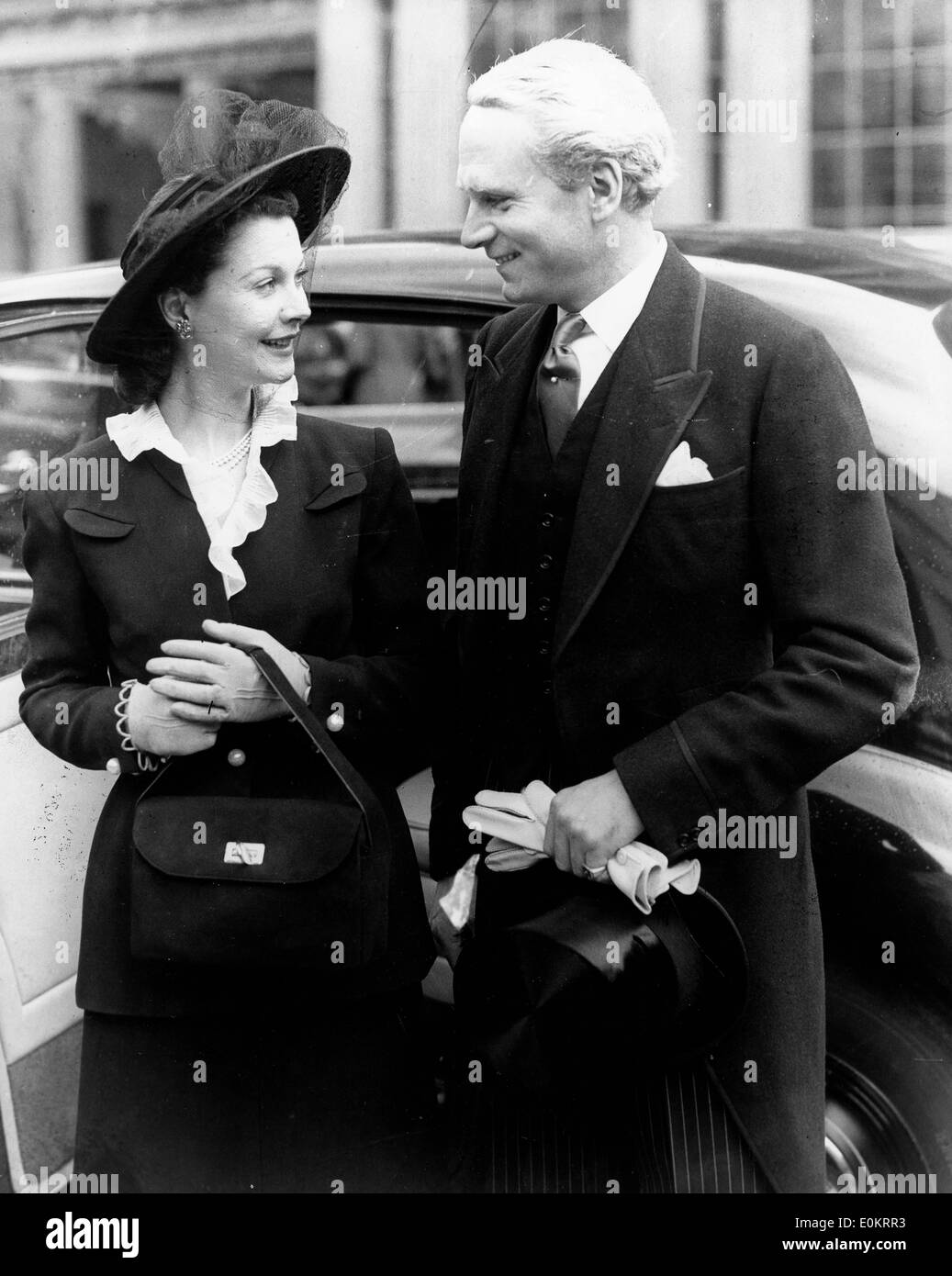 Actor Laurence Olivier with his wife after receiving his Knighthood Stock Photo