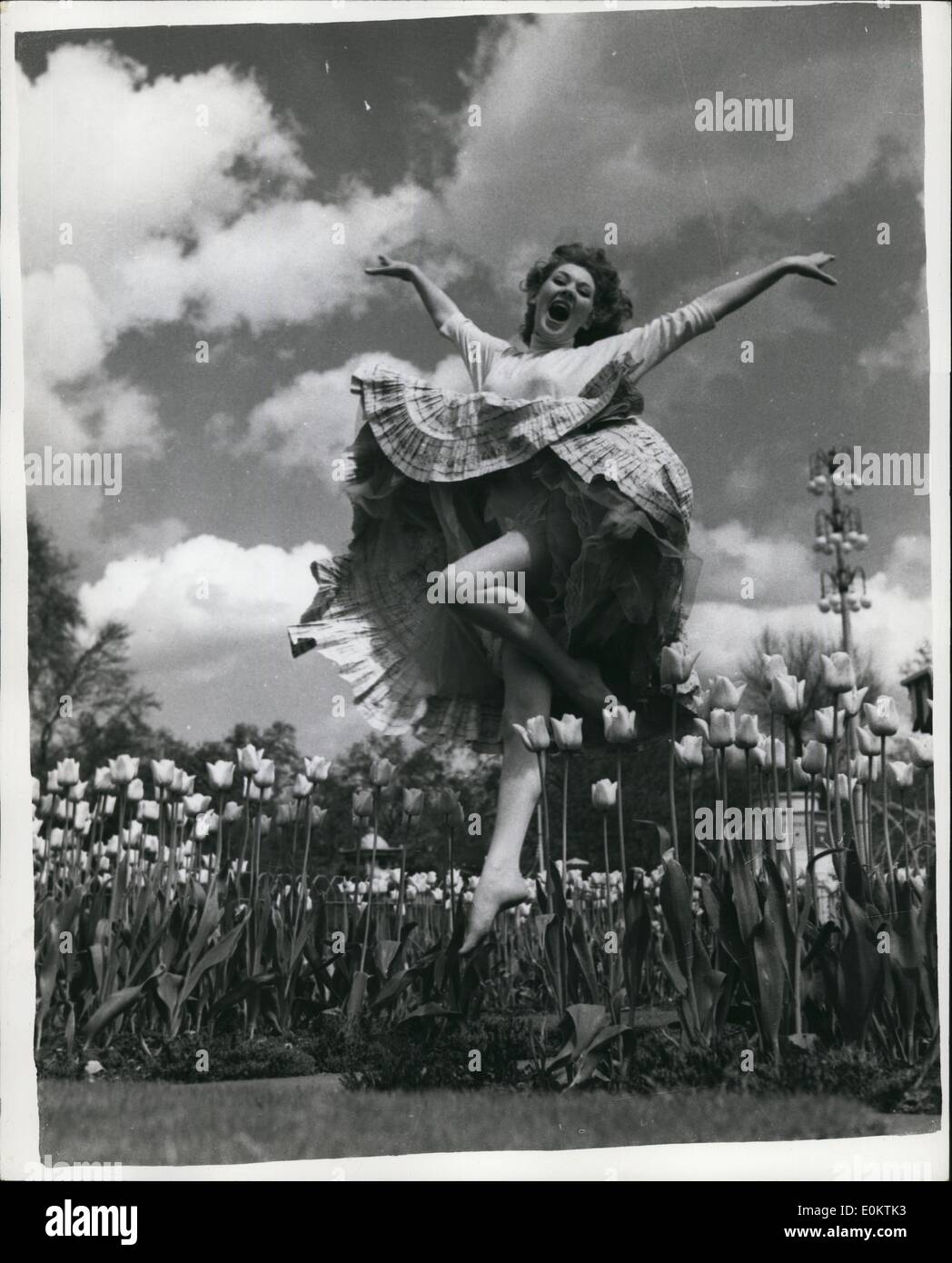 Jan 1, 1950 - Hooray and up she rises. Pat - on way to stardom: Pretty musical comedy actress Pat Lawrence feels on top of the world as this picture of her in a happy mood at the Batterses Festival Gardens shows. Pat has good cause to be happy for she has signed a 5 year contract with Associated Redifusion and is to star in the musical Hooray which goes into rehearsal soon. Pat is very fond of swimming and water skiing and has high hopes of becoming a top musical comedy star and why not. (exact date unknown) Stock Photo