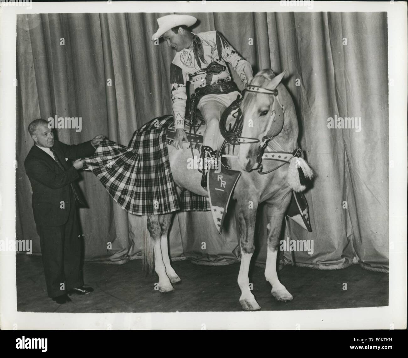 Jan 1, 1950 - Mac Trigger Has A Kilt: Looking more like a native of Scotland than the wild west is Roy Rogers' famous horse Trigger, all dressed up in a Scottish kilt on the occasion of his first British stage show at the Empire Theatre, Glasgow. Photo shows Trigger is fitted for his Dress Stuart Kilt by Mr. James Gordon of Thomas Gordon & Sons Ltd., well-known Scottish kilt manufacturers who export to countries all over the world. (exact date unknown) Stock Photo