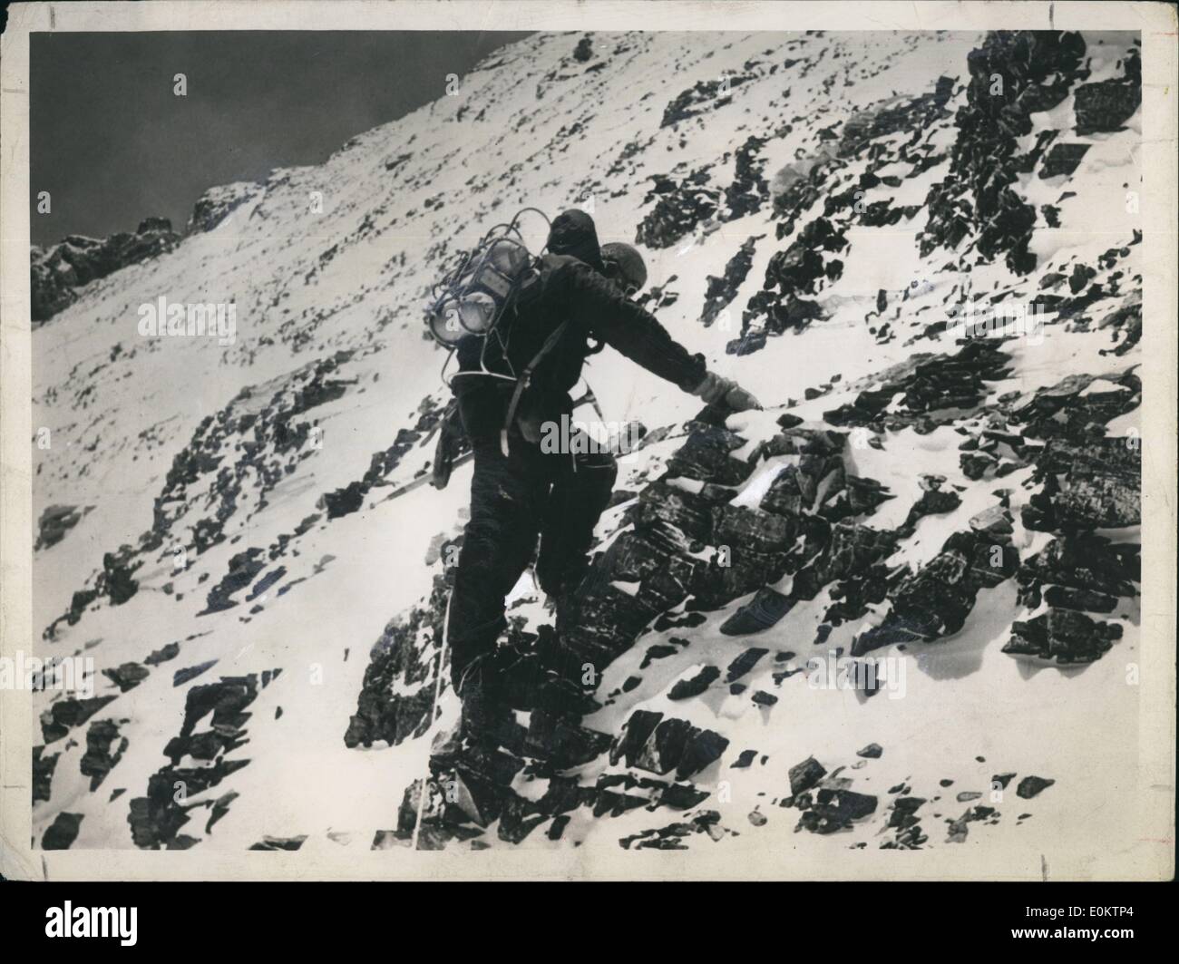 Jan 1, 1950 - Lowe climbing the ridge from the South Col en route to the final camp below t summit. (Times July Supplement - Stock Photo
