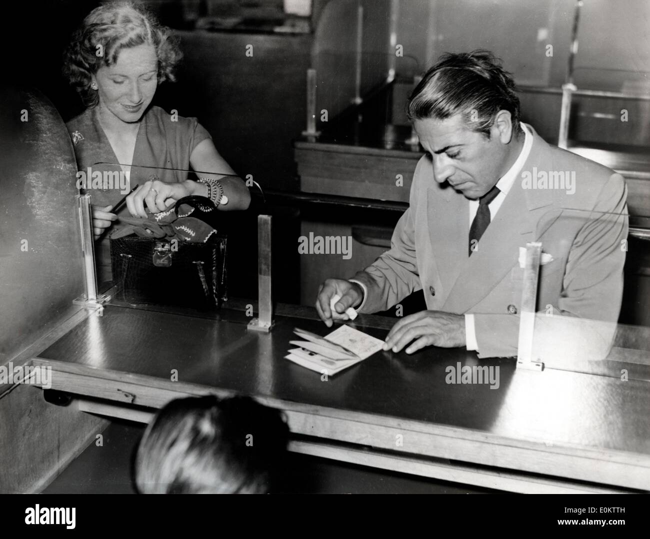 Aristotle Onassis at airport with wife Athina Stock Photo
