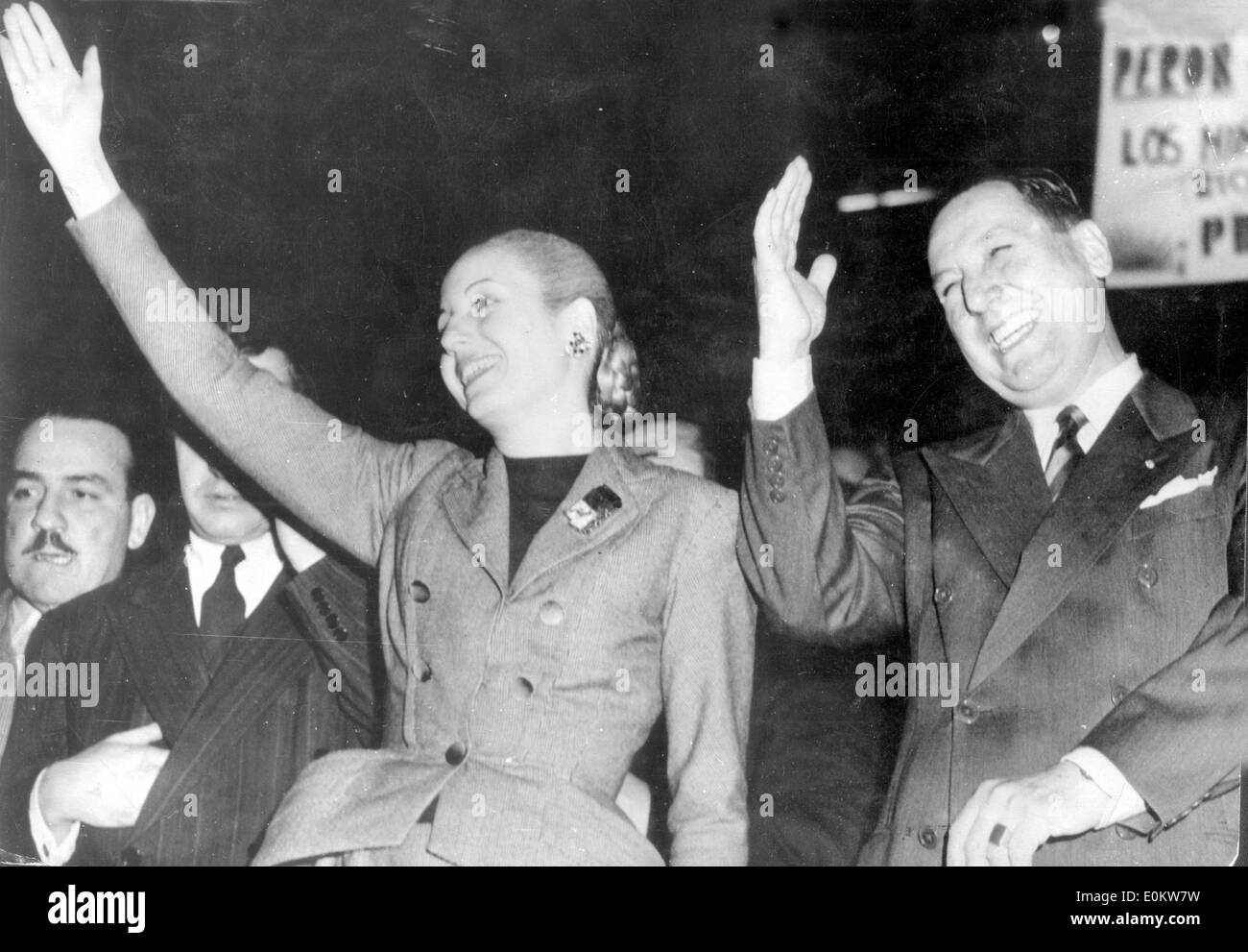 President Juan Peron and his wife Evita waving to the crowd Stock Photo